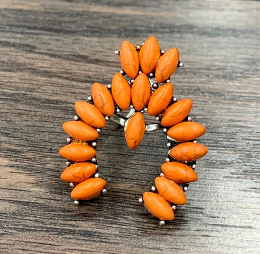Orange concho ring